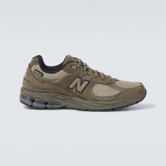 gefälschter Designer New Balance 2002R Turnschuhe mit Wildlederbesatz grün